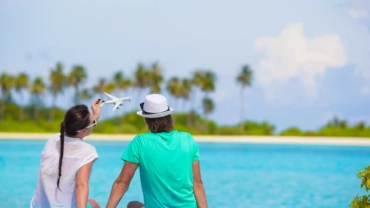 young happy couple on white beach at summer vacati 2023 11 27 04 59 11 utc