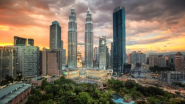 petronas twin towers lit up under a kuala lumpur s 2024 09 22 20 28 03 utc 1